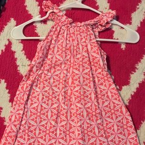 pink and white flowered tank top